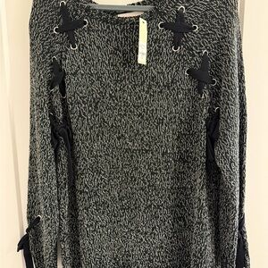 Black and White Knit Sweater with Lace-Up Sleeves